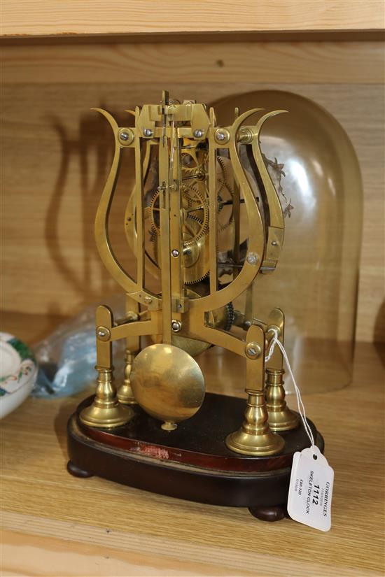 A skeleton clock under dome clock 27cm